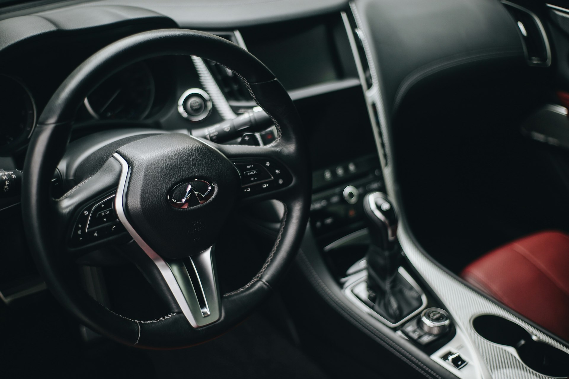 black and silver mercedes benz steering wheel